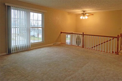 The crisp white spindles match the white trim and 