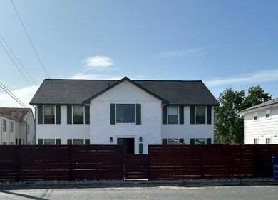 View of front of home with a fenced front yard