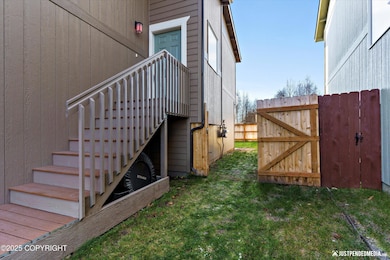 Gated and fully fenced backyard