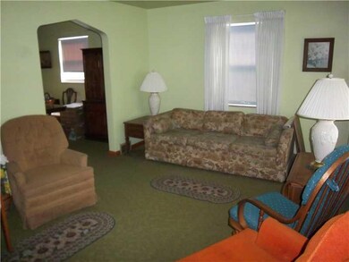 Living Room. The living room is 15 x 11 with hardw