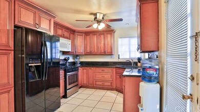 Custom Kitchen with Granite Counter-Tops and Cabin