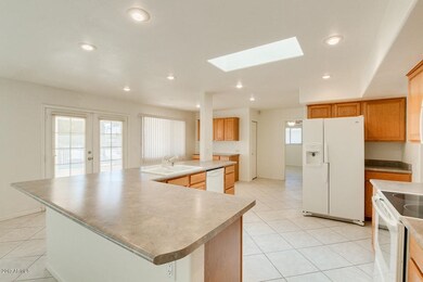 French Doors lead to enclosed Patio