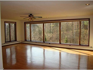 Living Room. Ample natural light,...