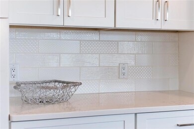 Custom Tile Backsplash
adds a designer touch.