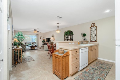 Open layout blends from the efficent kitchen through dining & living areas to sunny rear Lanai