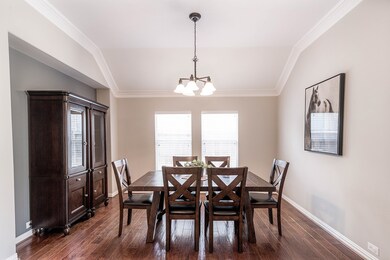 The formal dining room is on the right. Richly col