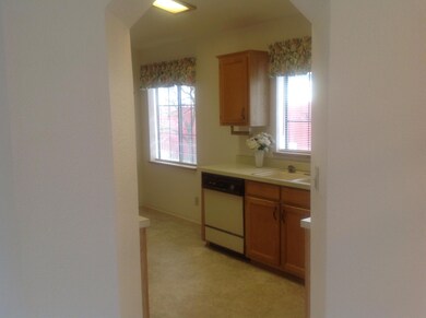 View of kitchen from dining room