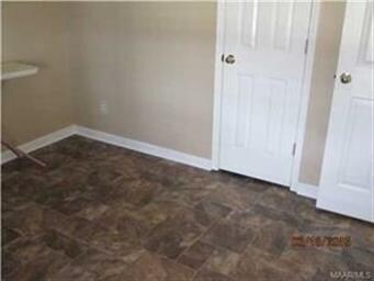 Partial view of a bedroom being used as a playroom