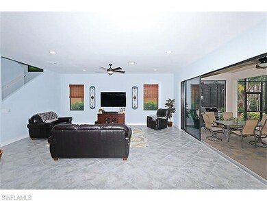 Living Room With Partial Covered Lanai View