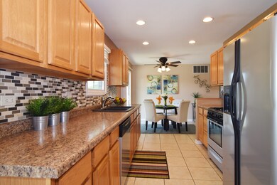 Kitchen also offers a pantry, access to the garage