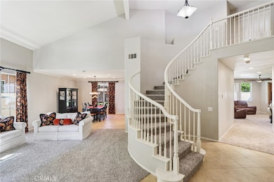 Grand Staircase and Formal Living and Dining Room