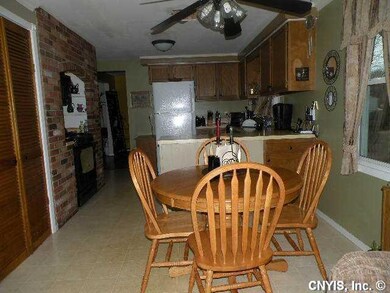 Exterior Front. Large eat-in kitchen with brick co