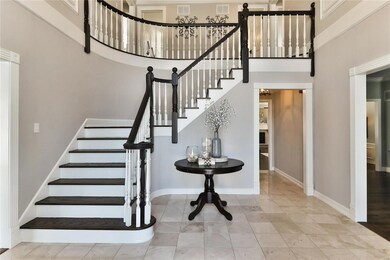 Turned staircase greets you upon entering