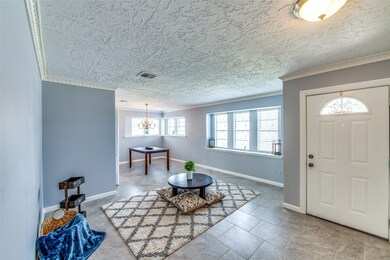 Gorgeous windows galore in the front rooms.