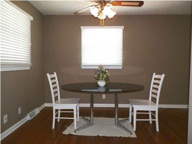 Dining Room with Ceiling Fan and lots of light.
