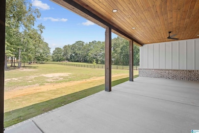 Beautiful rear porch with a tong and grove ceiling