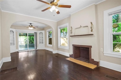 Living room with wood burning fireplace