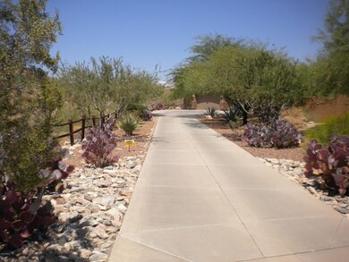 Long driveway w/large motorcourt