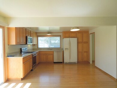 Remodeled kitchen with new cabinets, granite counters and newer appliances. Includes refrigerator.