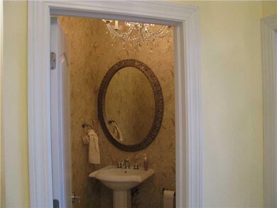 Partial Bath. Powder Room located off the Entry.