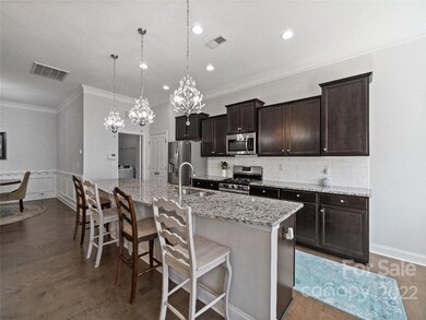 kitchen with large island and pantry