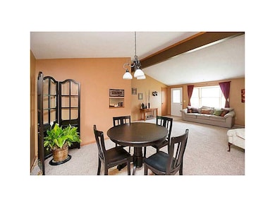 Dining Area. Vaulted ceiling extends into this din