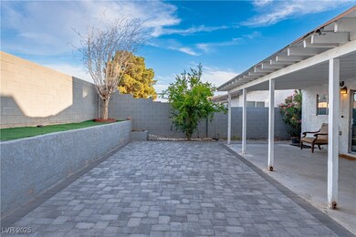 Fenced backyard featuring a patio