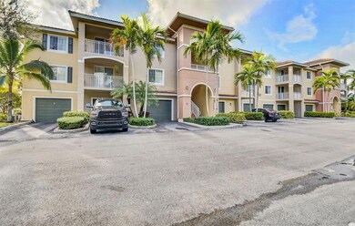 6511 Emerald Dunes Dr unit 208, West Palm Beach, FL 33411 - photo 2