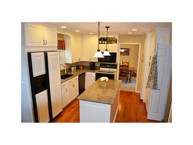 Kitchen. Newer cream cabinets, quartz countertops,