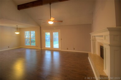 Large open living area.  Doors to the back yard an