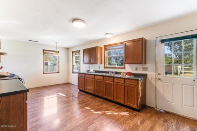 kitchen opens to deck and backyard