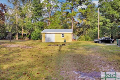 Sliding door on the side and two roll up garage do