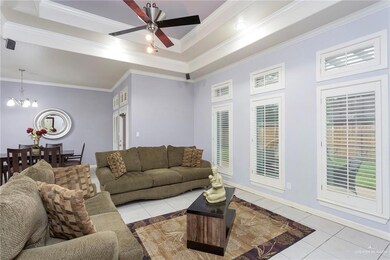 Great views of the back yard.  Pretty and clean with stair step ceilings and tile throughout.  Lots of room for entertaining and living.