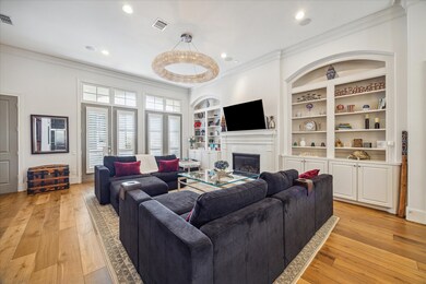 Huge living room with built in cabinetry