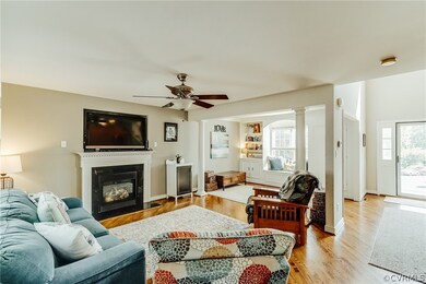 Open floor plan with custom built in bookshelves a