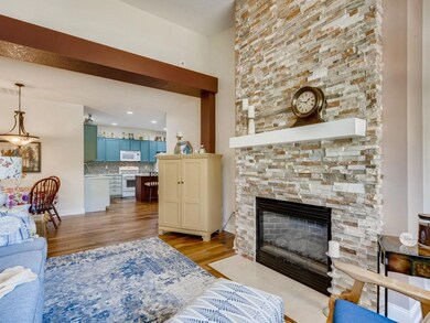 Beautifully upgraded gas fireplace w/ floor to cei