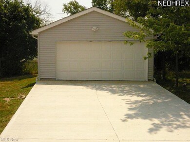 NEWER 2 CAR GARAGE AND DRIVE