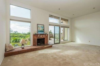 Spacious Living Room with fireplace, ocean view an