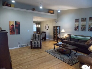 Vaulted ceiling with custom built shelf area for a