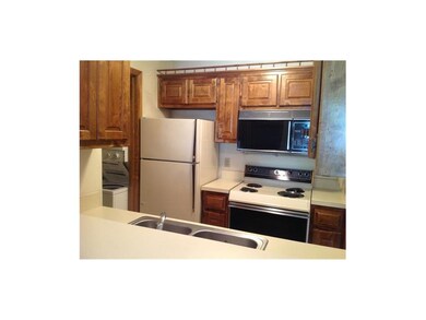 Kitchen.  All appliances stay.  Looks into pantry.