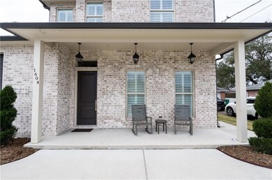This inviting front porch is waiting for you!  Com