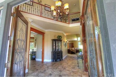 Grand entry with double beveled glass doors