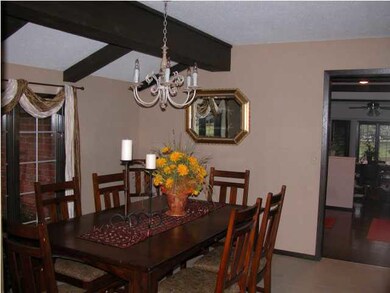 Wood beams add to the atmosphere of the formal din
