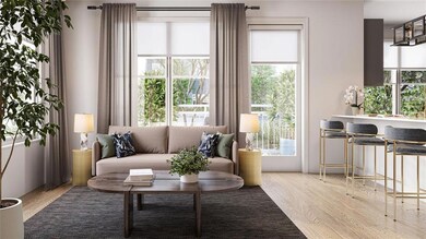 Living room featuring light hardwood / wood-style 