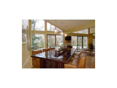 Dining room with wall of windows.