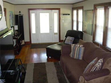 Spacious Living Room with hardwood floors