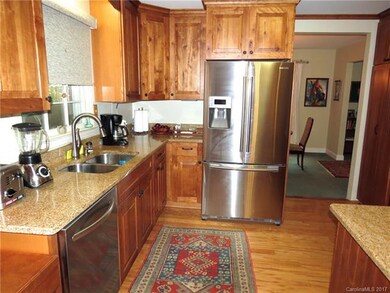 Updated Kitchen with Stainless Appliances and Gran