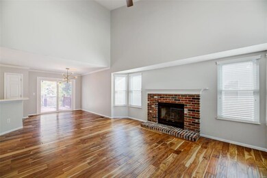 THE GREAT ROOM IS OPEN TO DINING AREA AND KITCHEN