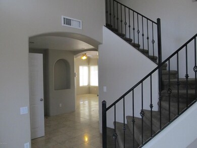 Staircase leading to 4 bedrooms