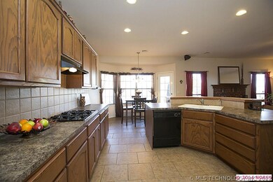 View from Kitchen into Breakfast Nook & open Famil